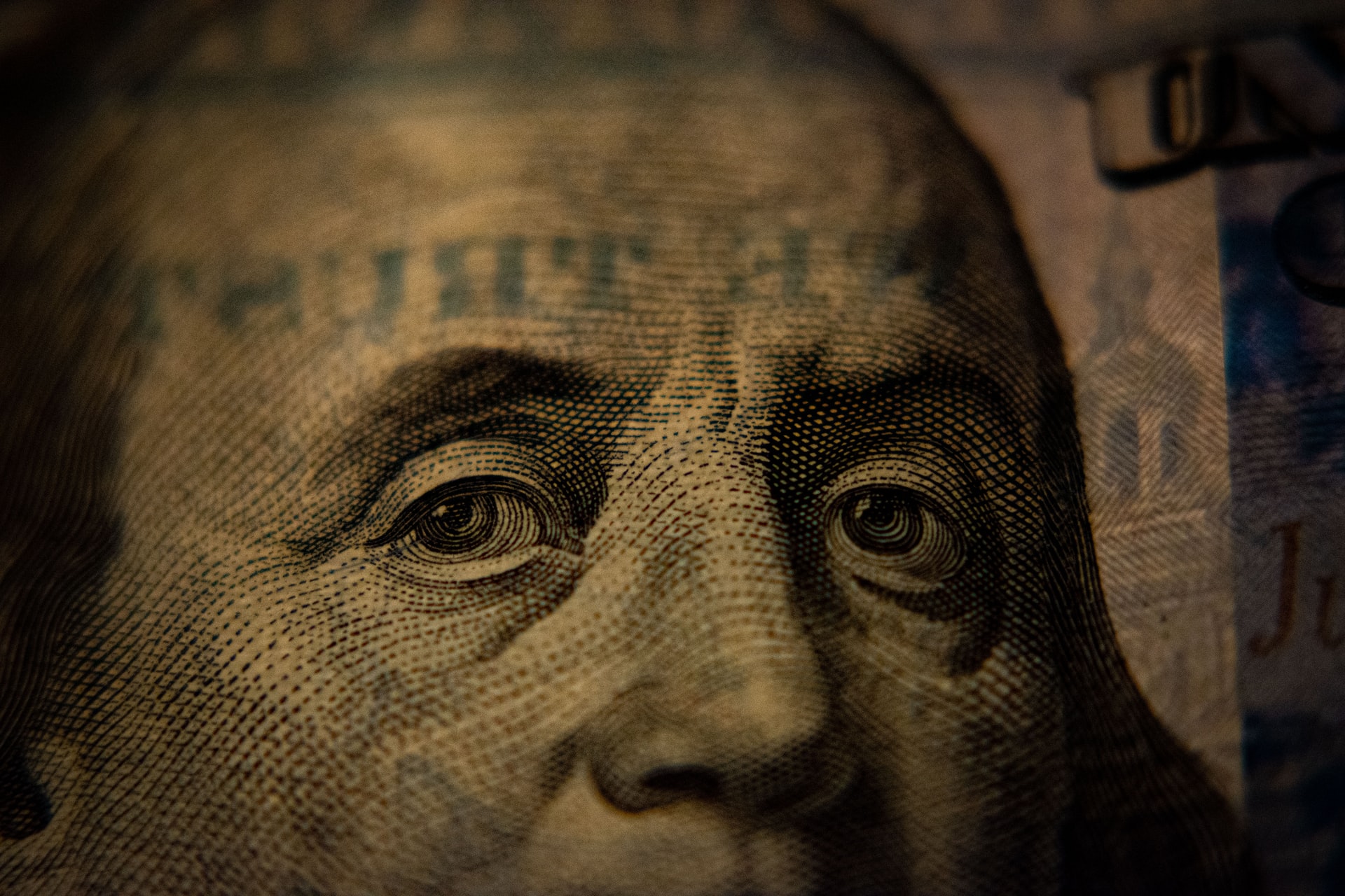 A close up of a dollar bill.